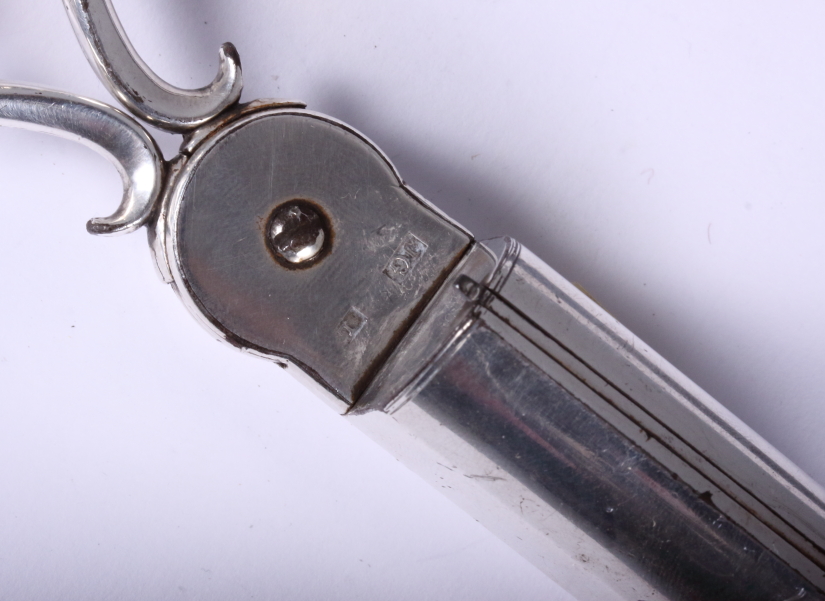 An early 20th century nielloware cigar cutter, 9" long, and a pair of late Victorian silver plate - Image 3 of 3
