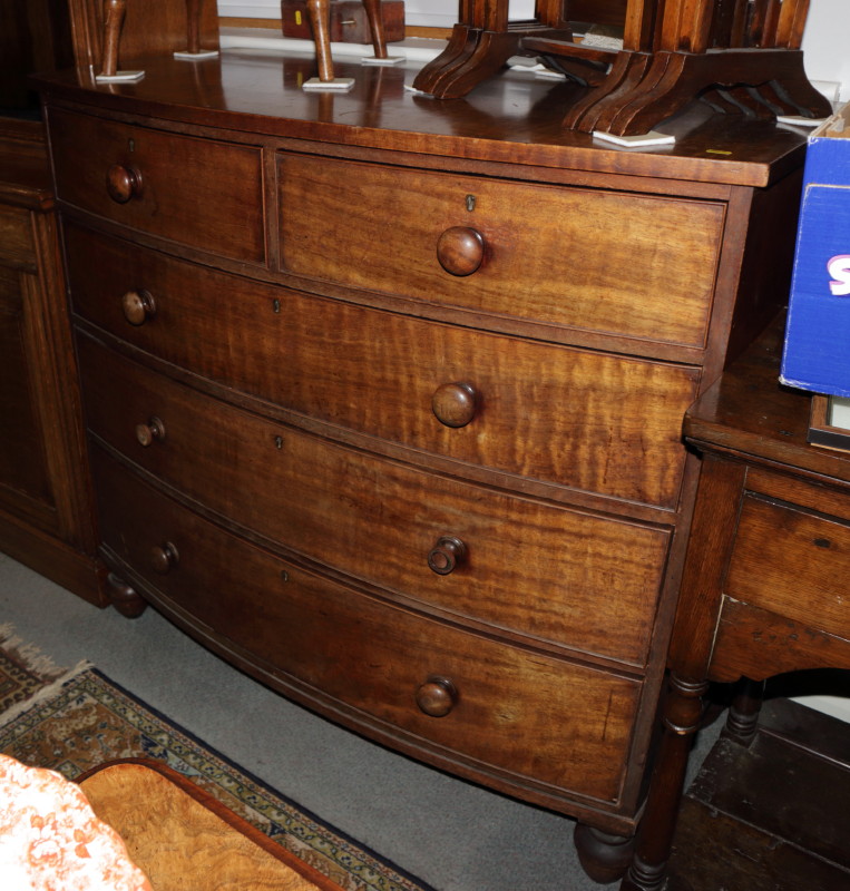 A 19th century mahogany chiffonier with ledge back, the base fitted two drawers and cupboard