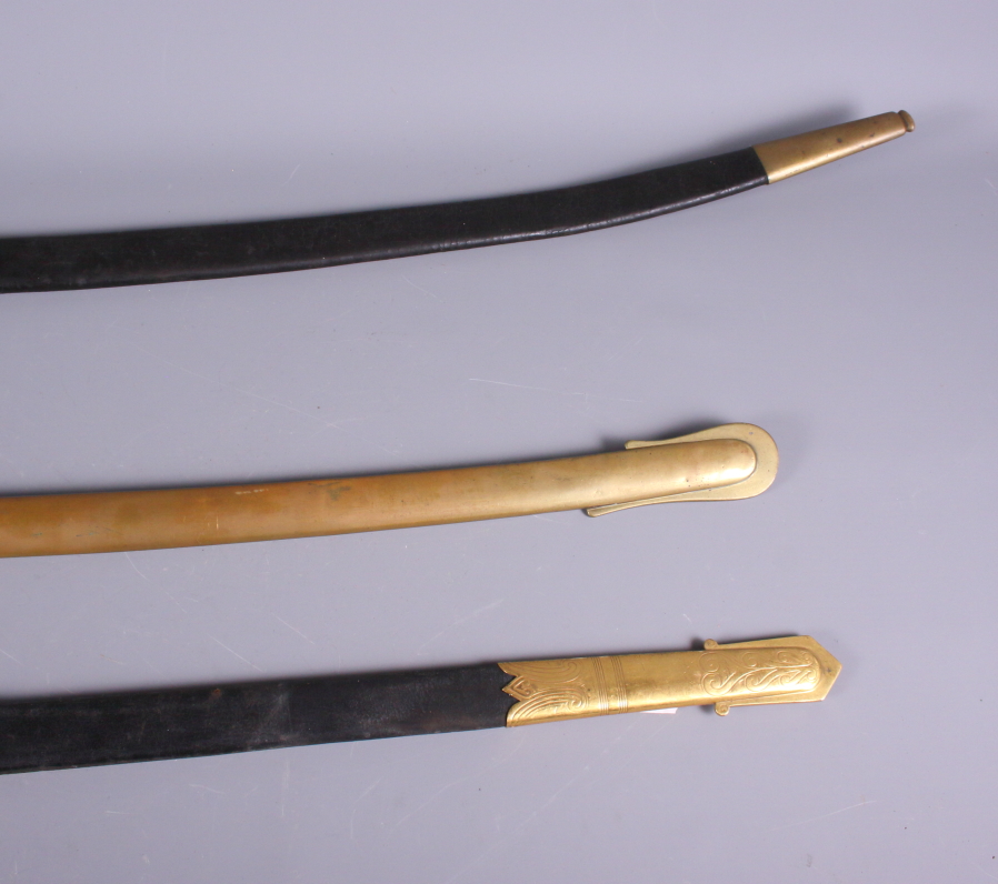 A Wilkinson & Son officer's sword scabbard, a 19th century brass scabbard, and an 18th century - Image 4 of 4