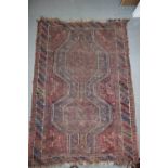 Two Afghan rugs (worn)