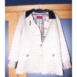 A Burberry gold quilted jacket, size 44