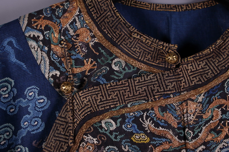 A Mandarin embroidered silk robe with dragons on a blue ground - Image 9 of 10