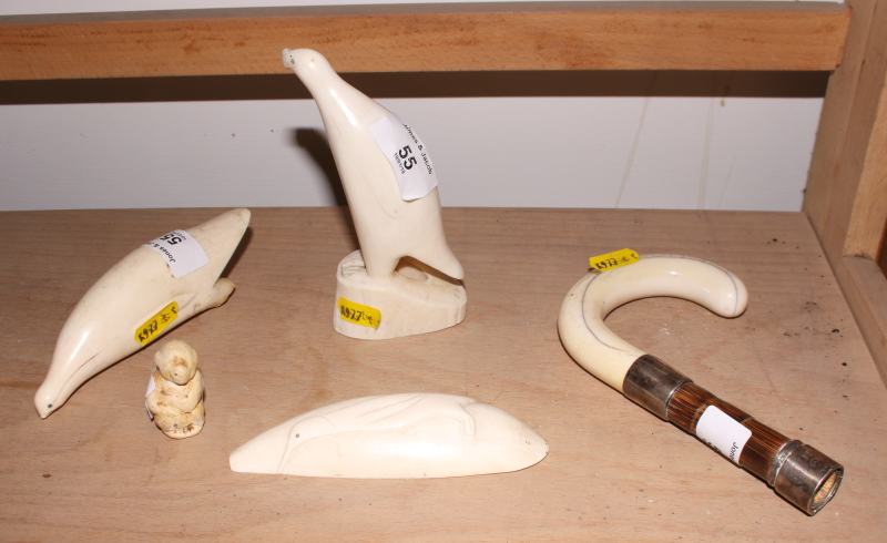 A collection of various sperm whale scrimshaw carvings a carved ivory cane handle with silver collar - Image 2 of 18