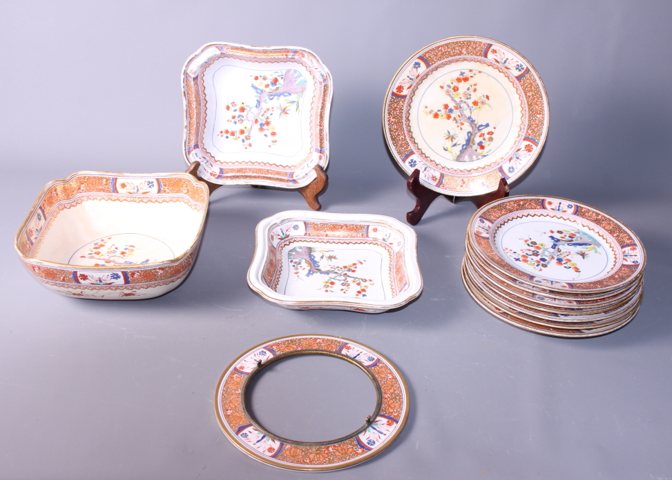 A 19th century English porcelain part dinner service, decorated in the Chinese style and painted