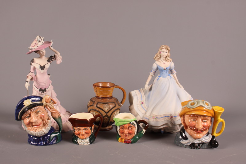 Four Royal Doulton porcelain character jugs, "Veteran Motorist" D6637, "Old Salt" D6554, "Caine