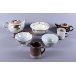 A collection of various mid 20th century studio pottery, including teapots, bowls, etc,