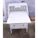 A grey painted fall front bureau, fitted three drawers, on square taper supports, and a fall front