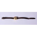 A lady's 18ct gold cased Omega Ladymatic wristwatch with silvered dial and baton numerals, on a
