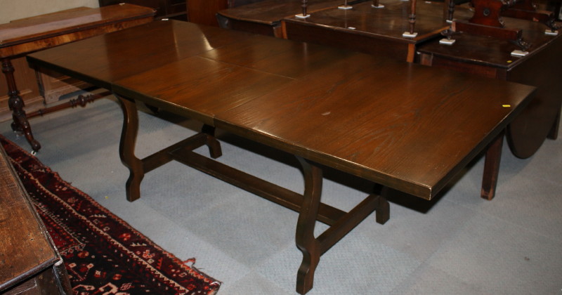 An oak refectory table of 17th century Continental design, on 'H' stretchered supports, top 62" x