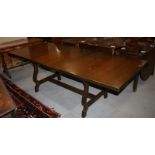 An oak refectory table of 17th century Continental design, on 'H' stretchered supports, top 62" x
