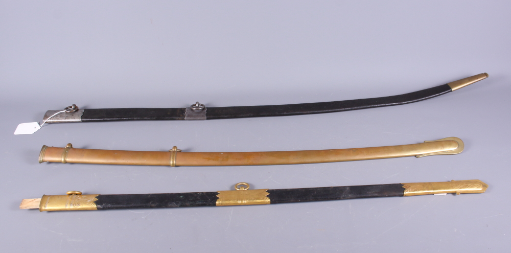 A Wilkinson & Son officer's sword scabbard, a 19th century brass scabbard, and an 18th century