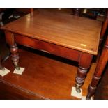 A 19th century mahogany occasional table, on turned and castored supports, 20" wide
