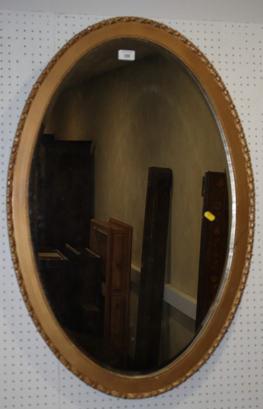 A 19th century design gilt circular wall mirror, carved with acanthus leaves, and an early 20th - Image 2 of 2