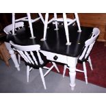 A painted pine farmhouse kitchen table, on turned supports, 55" x 35 1/2", together with a set of
