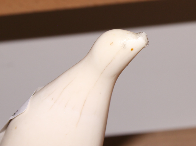 A collection of various sperm whale scrimshaw carvings a carved ivory cane handle with silver collar - Image 15 of 18