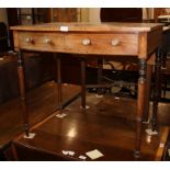 A Georgian mahogany and ebony box line inlaid bowfront side table, fitted two drawers, on turned and