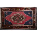 A Persian prayer rug of traditional design, 44" x 27" approx