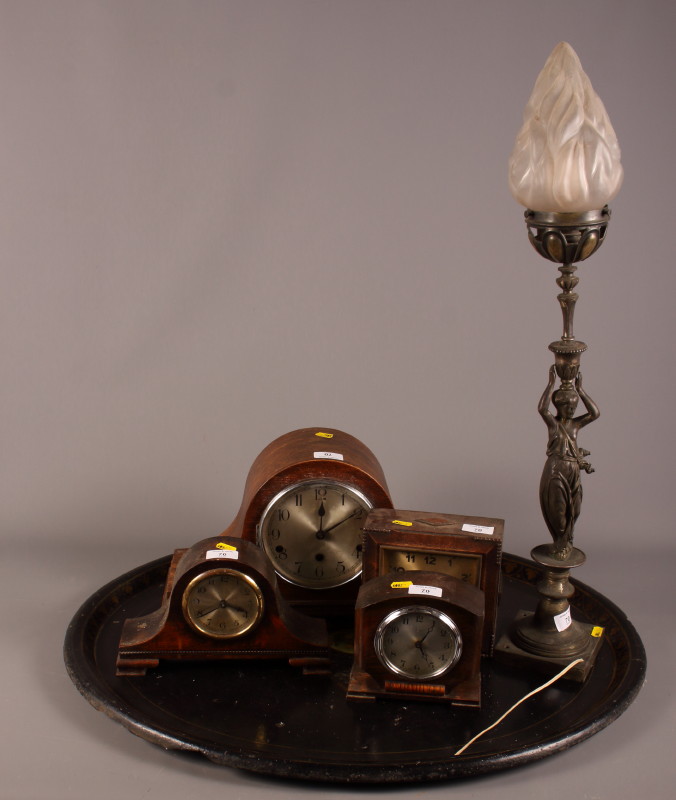 Four early 20th century oak cased drum head and other mantel clocks, a lamp in the form of a