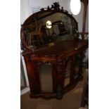 A late Victorian burr walnut credenza with raised shaped mirror back over four arch top mirror