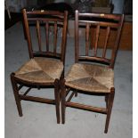 Two walnut rush envelope seat bedroom chairs