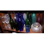 Three cut glass fruit bowls, a number of cut glass vases, blue glass and other bottles, etc