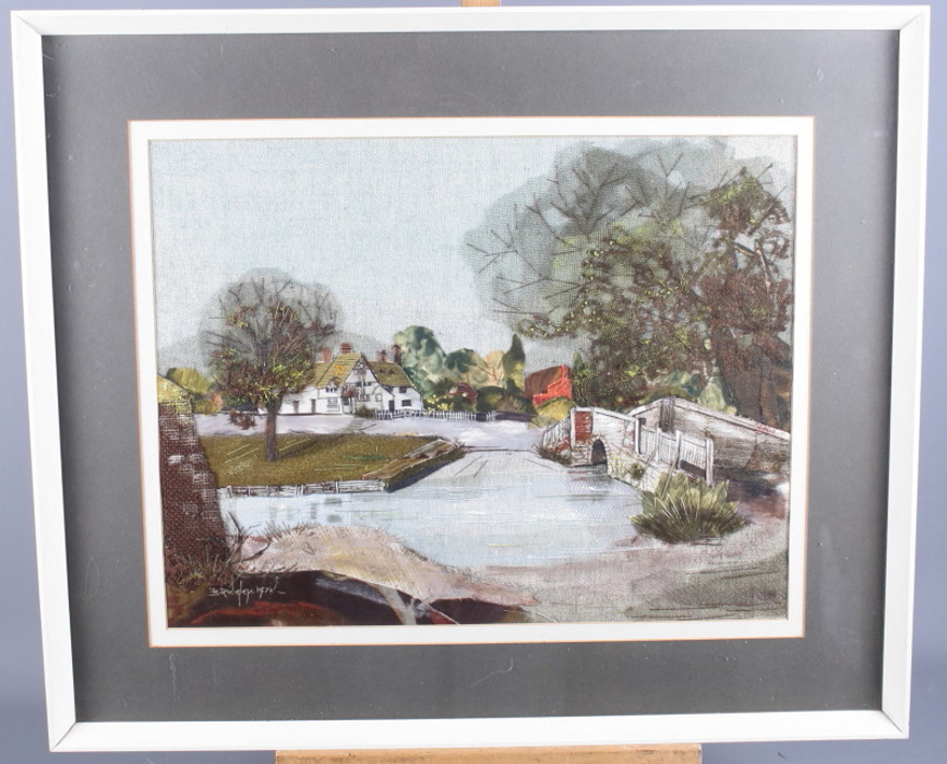 A mid 20th century patchwork panel of a riverside village with a bridge, by B Ridgley, 13" x 17", in