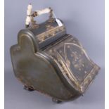 A late 19th century painted toleware coal scuttle with scoop and ceramic handles, 20" high