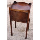 A late Georgian mahogany tray top bedside cupboard, on chamfered supports, 15" wide