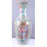 A 19th century Chinese enamelled famille rose porcelain baluster vase, decorated with panels of