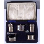 A silver five-piece cruet with blue glass liners, in fitted case