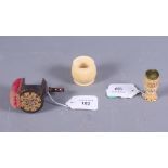 A 19th century Tunbridge ware sewing clamp and pin cushion, a vegetable ivory pin cushion and a