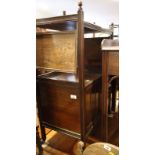 An Edwardian walnut service trolley, fitted two flaps and cupboard, 26" wide