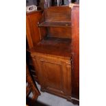 A 19th century figured and quarter cut oak side cabinet, fitted shelf over panelled door, on block