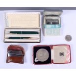 A Parker pen and pencil set, in case, a Ronson lighter, in case, a 1937 Royal Mint Coronation