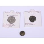 A Greek coin dated 244-249AD, a Byzantium coin, 610-641AD, and one other