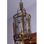 A brass three-light ceiling lantern of Georgian design, 30" high