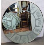 Osvaldo Borsani: a pair of circular signs of the zodiac engraved wall mirrors, in silvered frames,