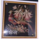 A 19th century needlepoint panel of a pheasant and flowers on a black ground, 28" x 31", in gilt