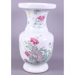 A Chinese porcelain famille rose vase, possibly Republic period, decorated with enamels of flowers