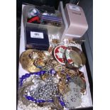 A selection of costume jewellery, commemorative crowns, cloth badges, etc