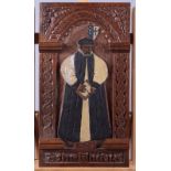 A late 19th century carved oak panel depicting John Whitgift, Archbishop of Canterbury 1583-1604,