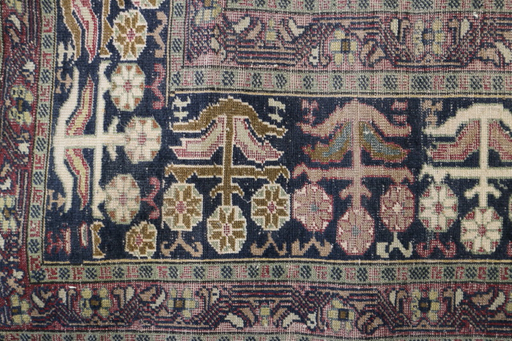 A Persian prayer rug with lantern design on a red ground and floral borders in shades of blue, red - Bild 4 aus 4