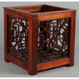 A mahogany fretwork planter of Chippendale design, 10" square