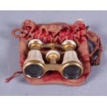 A pair of 19th century brass and mother-of-pearl opera glasses, one other pair, a pair of painted