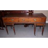 An early 19th century mahogany banded and ebony strung square piano (now a sideboard), on reeded