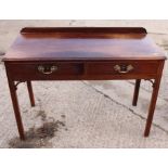 A late Georgian mahogany dressing table, fitted two drawers, on moulded chamfered supports, 44"