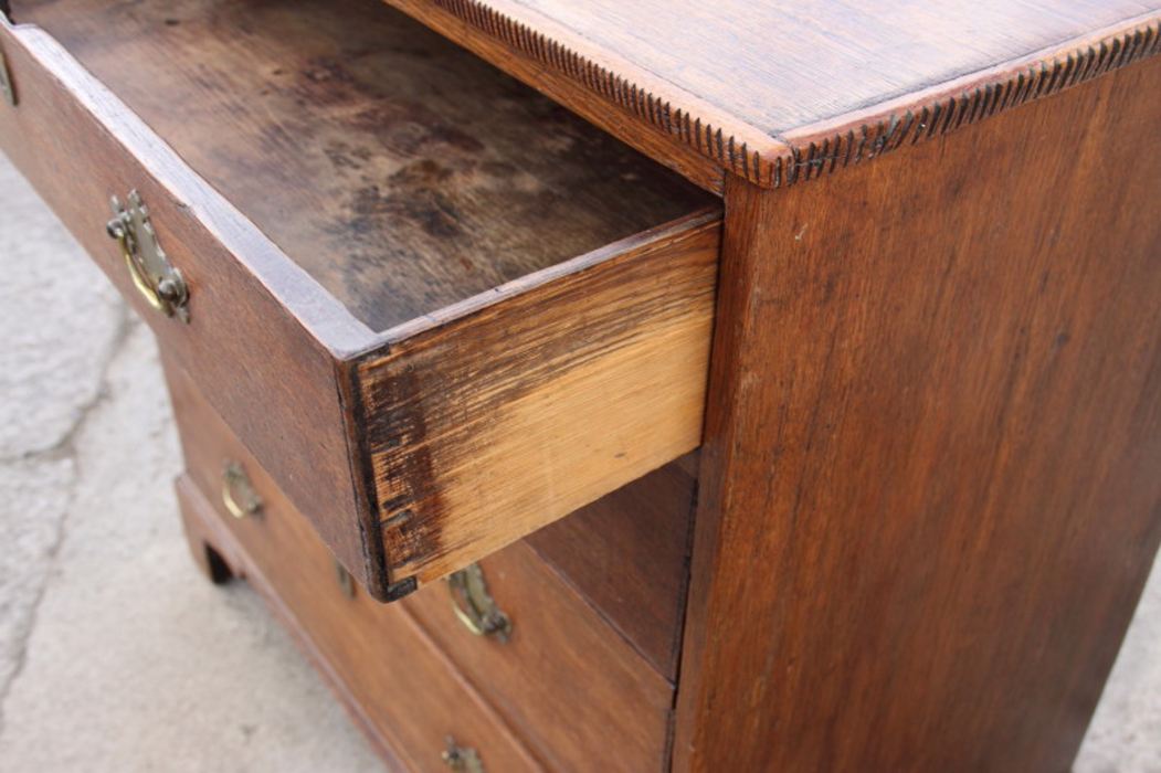 An early 19th century oak chest of four graduated long drawers, on bracket feet, 34" wide - Image 2 of 2