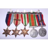 A collection of WWII medals, 1939-1945 Star, Africa Star, Italy Star, Defence Medal, 1939-45