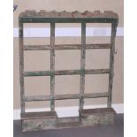 A green painted auricula rack with hanging hooks and two drawers, 40" wide