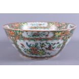 An early 20th century Chinese enamelled famille rose porcelain bowl, decorated with panels of birds,